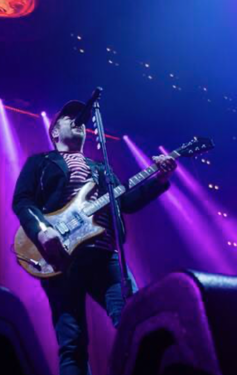 Patrick Stump from Fall Out Boy performing on stage https://triblive.com/aande/music/fall-out-boy-deliver-arena-sized-emo-spectacle-in-pittsburgh-show/
